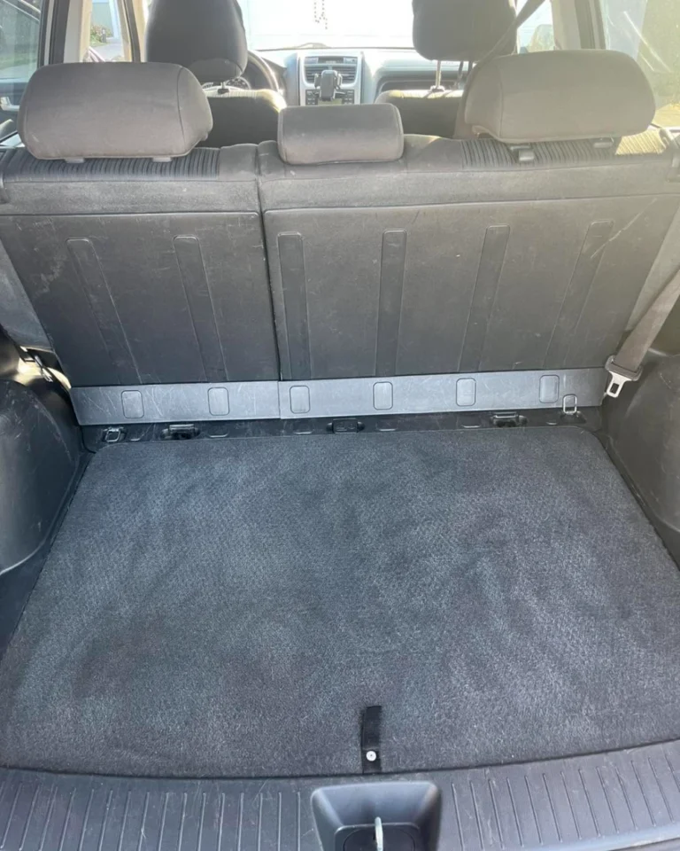 Clean trunk cargo carpet after vacuum and shampoo