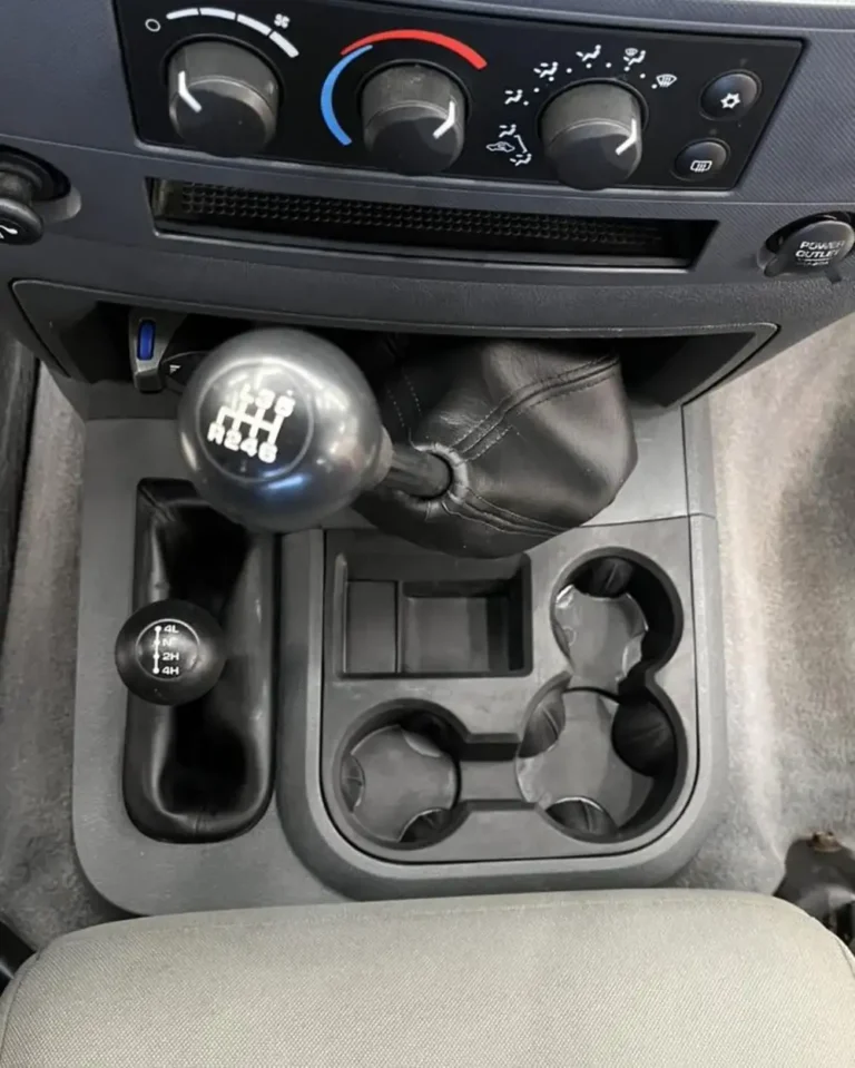 Clean truck center console, controls, and cup holders after interior detailing