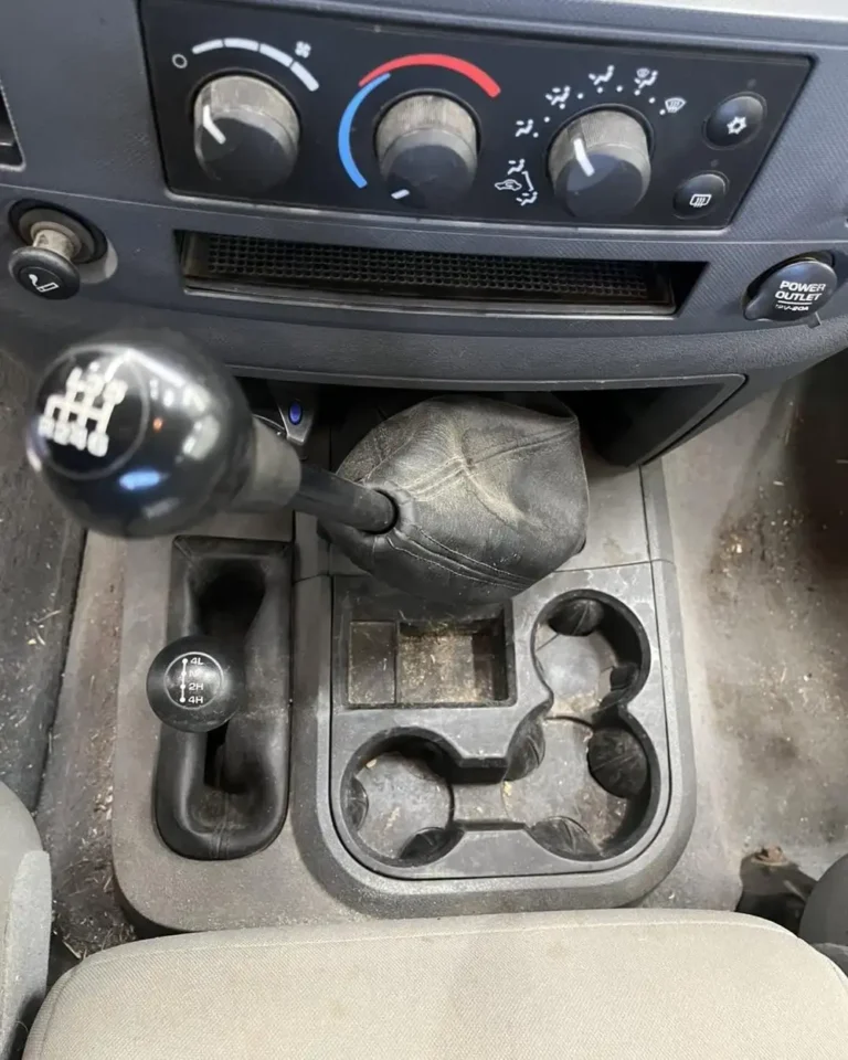 Dirty truck center console and shifter before interior detailing